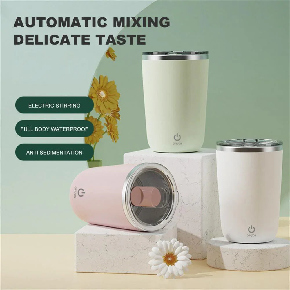 Electric self-stirring cups in pastel colors, waterproof, with power buttons, on marble stands.