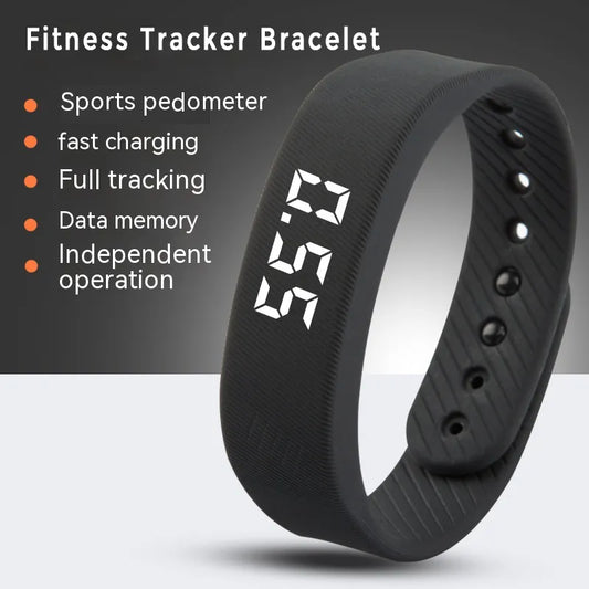 Black sports bracelet fitness tracker with digital display showing step count.