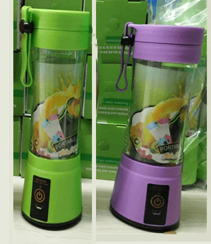 Portable personal blender in green and purple with clear blending jar and power button